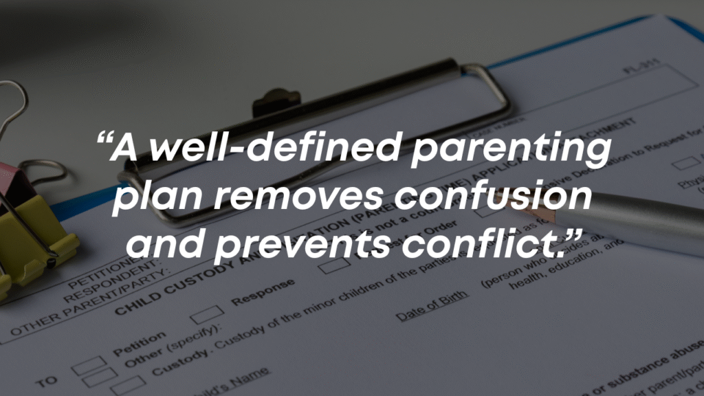 A signed child custody agreement and pen on a desk, representing the process of creating a detailed parenting plan.