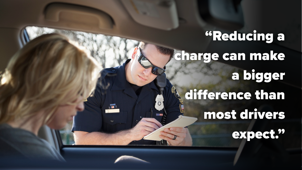A person getting pulled over by a cop, facing the possibility of facing paying a traffic ticket with a quote on the right side that reads: “Reducing a charge can make a bigger difference than most drivers expect.”